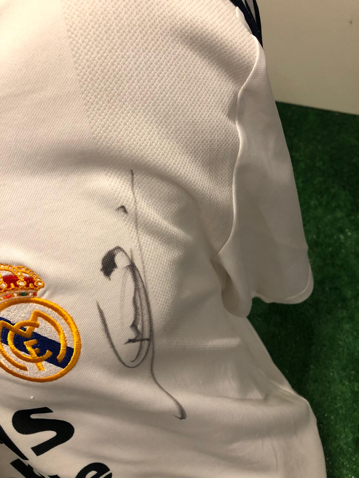 Camiseta blanca firmada